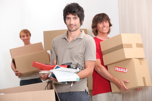 Careful loading of items into a man and van vehicle