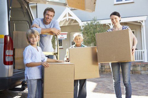 Local Soho moving service handling boxes and furniture