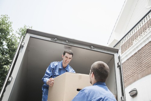 Careful loading of office items for a move near Soho and the West End